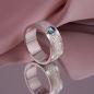 Preview: Handgefertigter Silberring Nerion mit rundem Swiss Blue Blautopas im Cabochon-Schliff.